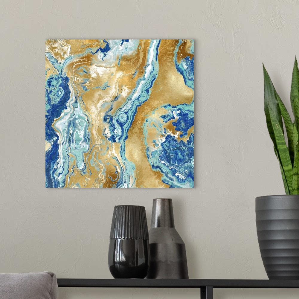 A modern room featuring Square abstract decor with a blue, white, and gold onyx design.