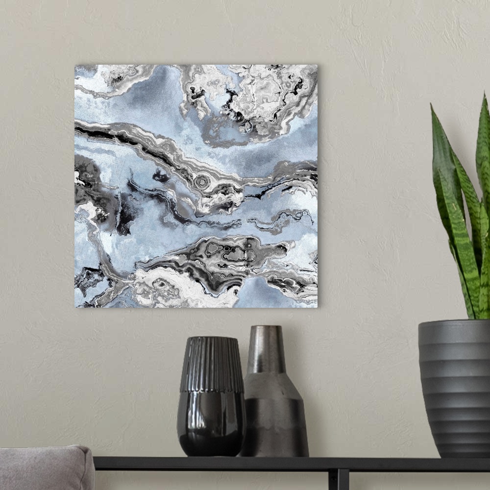 A modern room featuring Square abstract decor with a blue, black, gray, and silver onyx design.