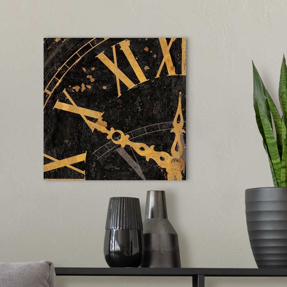 A modern room featuring Square decor with a close-up of gold roman numerals on a clock.