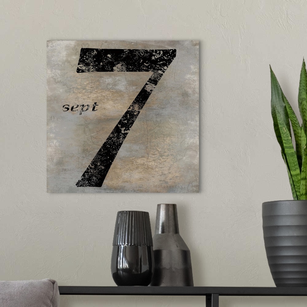 A modern room featuring French 7 sign in black, gold, and gray hues with a faint illustration of a map on the background.