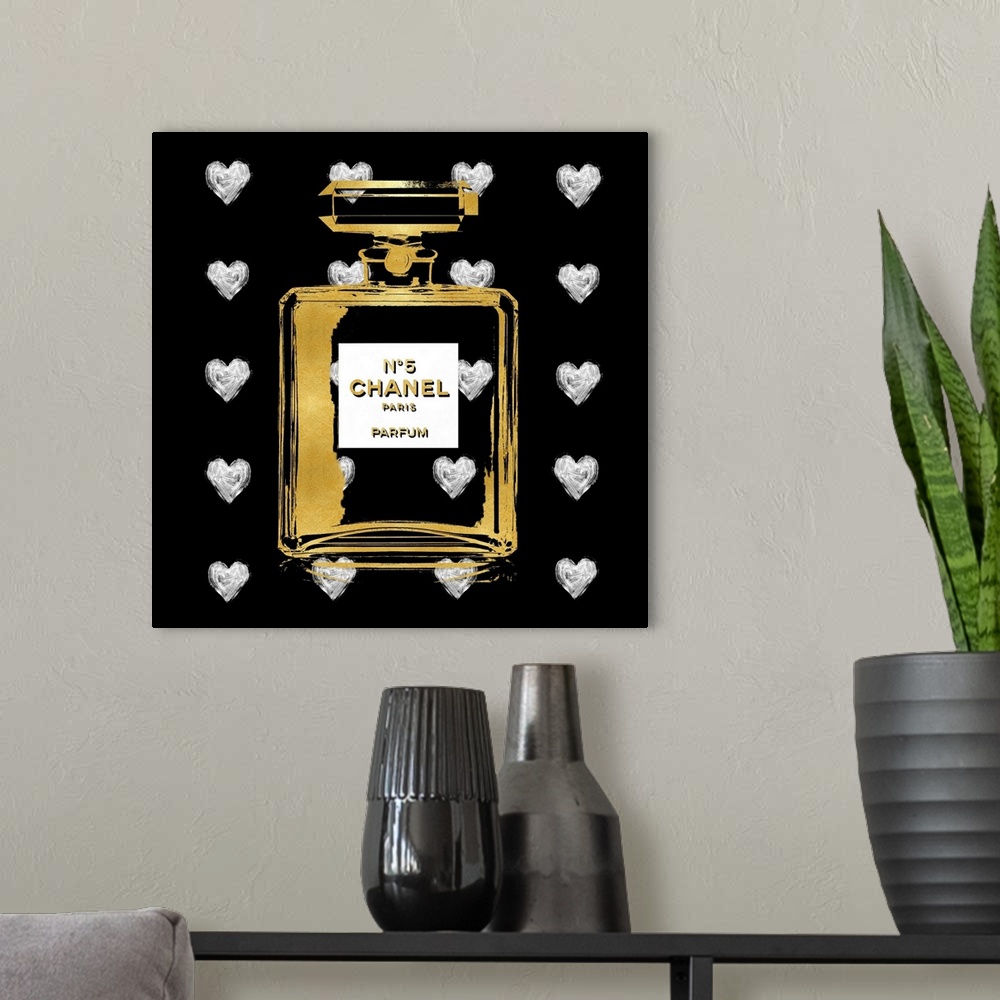 A modern room featuring A black background with hearts peek through a transparent bottle of perfume.