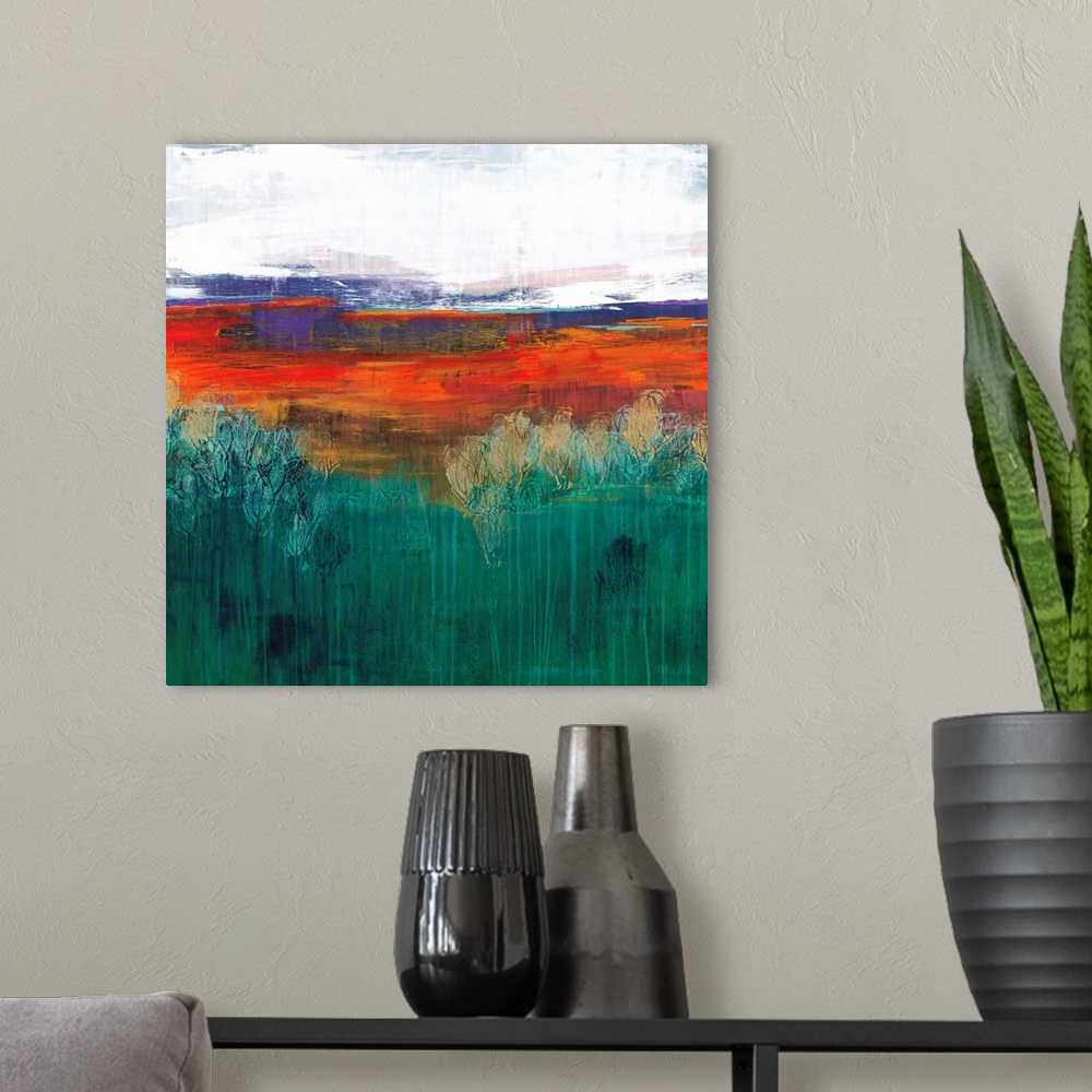 A modern room featuring Square abstract painting in textured colors of green, orange, red and gray.
