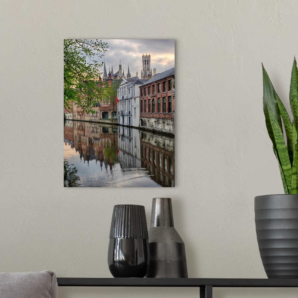 A modern room featuring Europe;Belgium;Brugge;West Flanders;Canal Scene with homes and Bridge