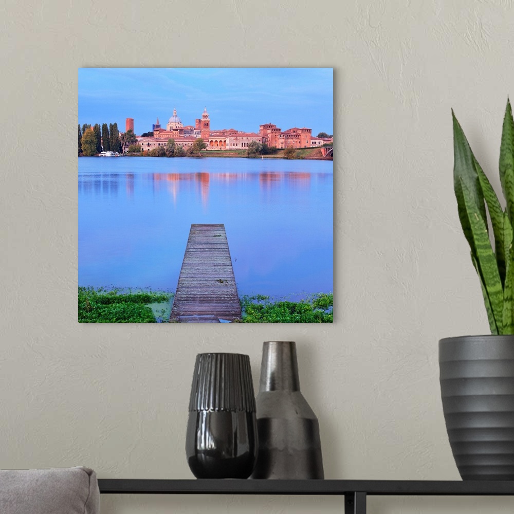 A modern room featuring Italy, Lombardy, Mantova district, Mincio river, Mantua, View towards the town and Lago Inferiore...