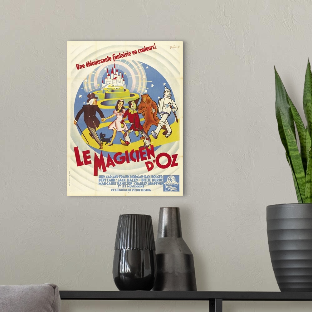 A modern room featuring The Wizard Of Oz, (AKA Le Magicien D'Oz), French Poster Art, From Left: Wizard Of Oz, Toto The Do...