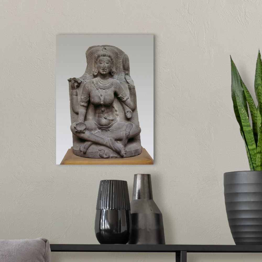 A modern room featuring Yogi. 10th c. Hindu art