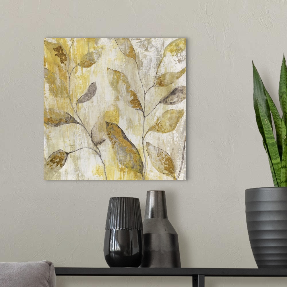 A modern room featuring Semi-abstract contemporary art print of golden leaves.