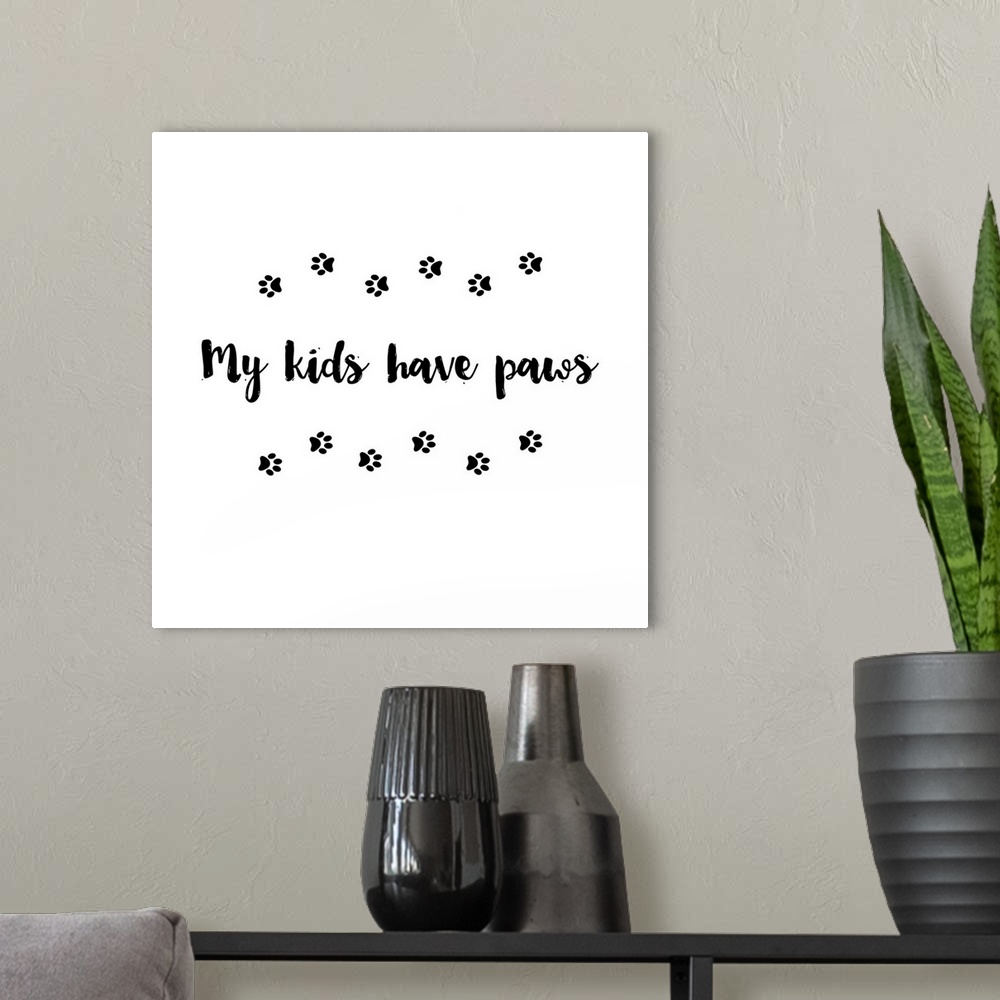 A modern room featuring Humorous sentiment art for dog lovers with a paw print design.