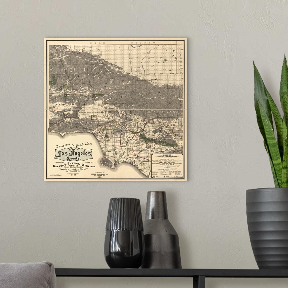 A modern room featuring Square vintage road map for Los Angeles from 1900.
