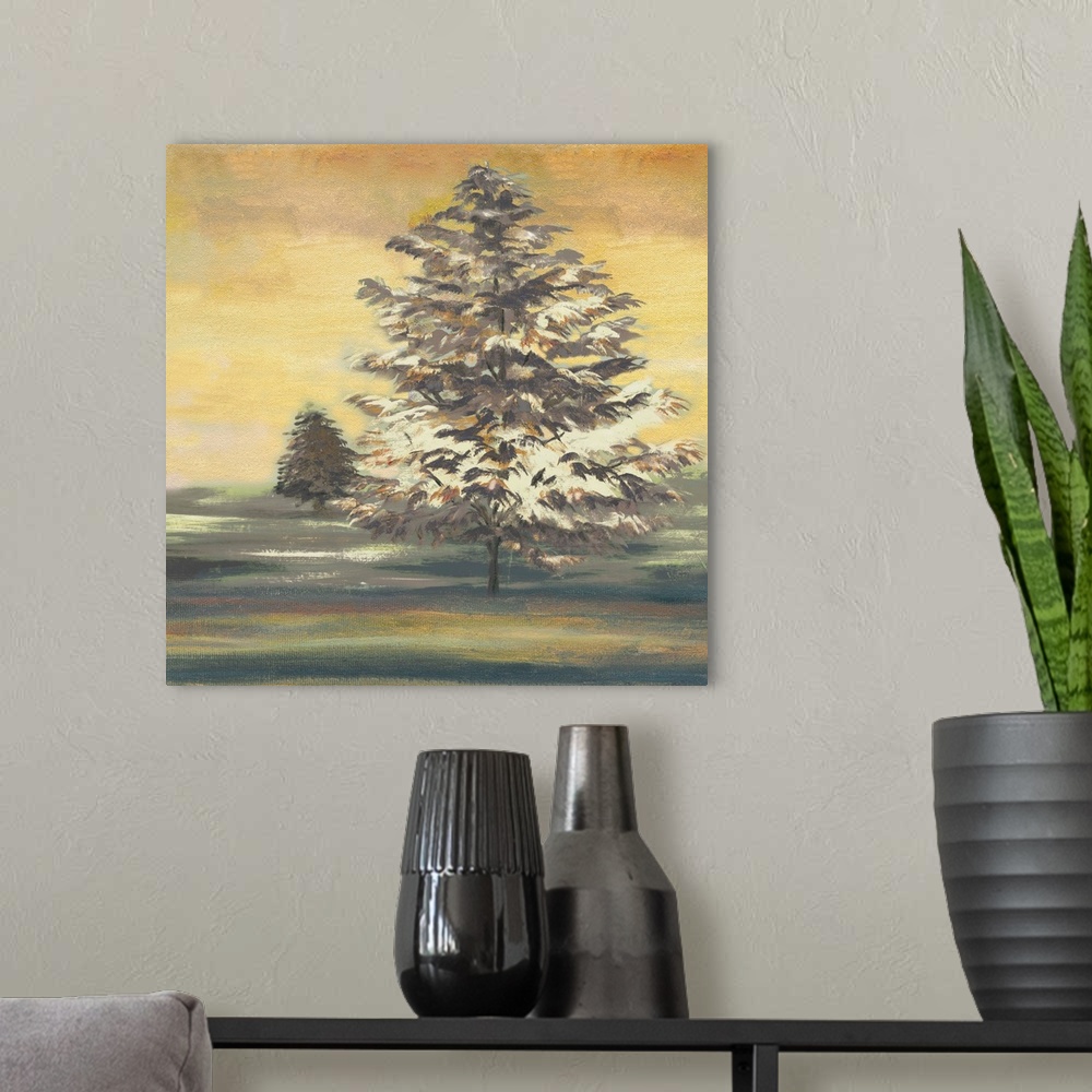 A modern room featuring Square painting of an Autumn sunset with two large trees.