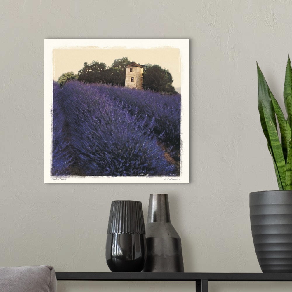 A modern room featuring Big canvas art showing a vast field of purple flowers with a small farm or ranch house and forest...