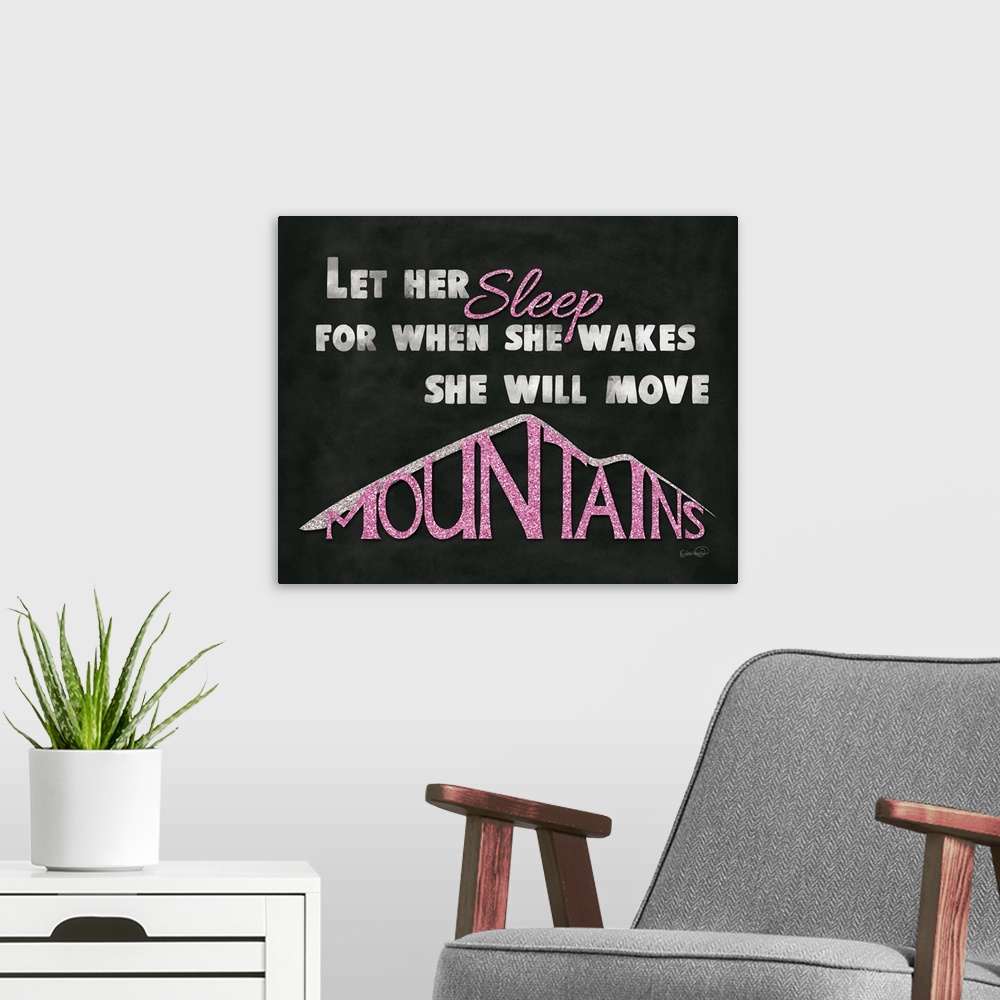 A modern room featuring "Let Her Sleep For When She Wakes She Will Move Mountains"