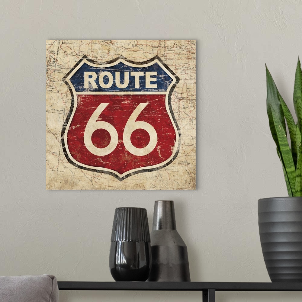A modern room featuring Vintage red and blue Route 66 sign with an old map on the background.