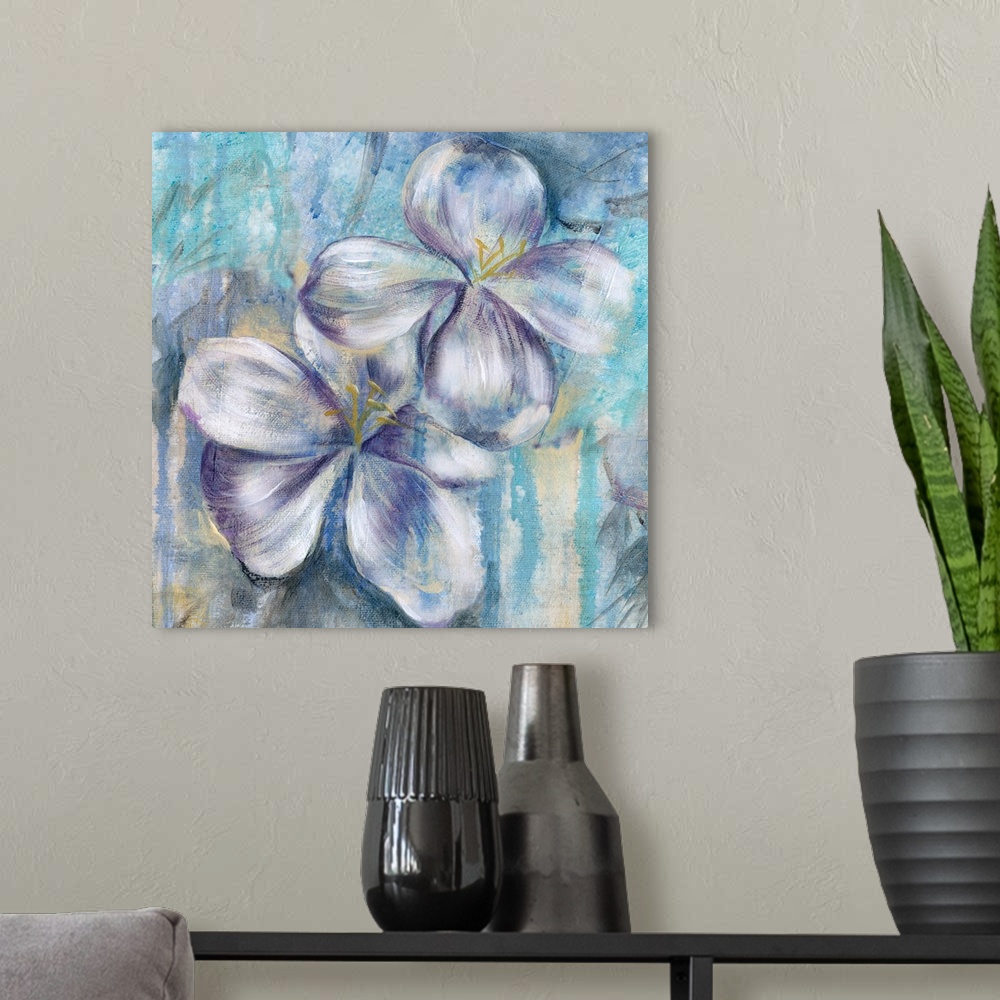A modern room featuring Square painting of two purple and white flowers on a blue and yellow background.