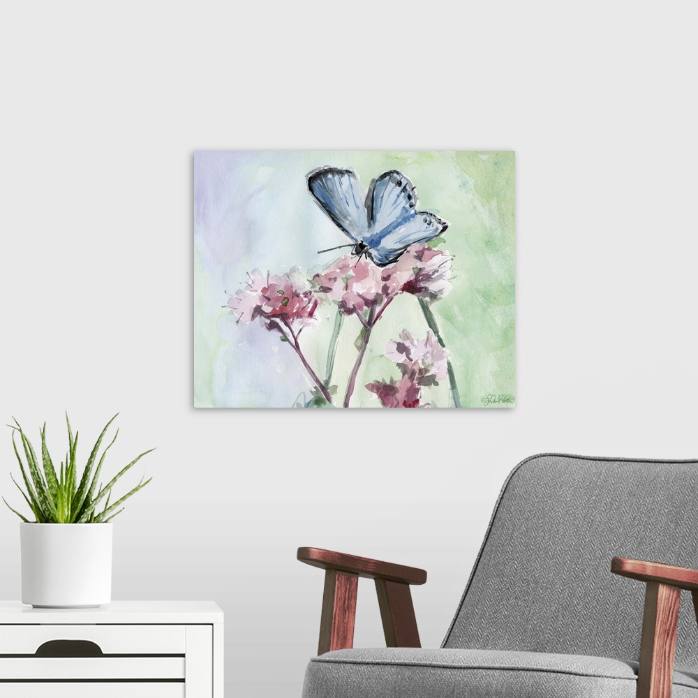 A modern room featuring Watercolor painting of a blue butterfly on top of pink flowers with a background made up of green...