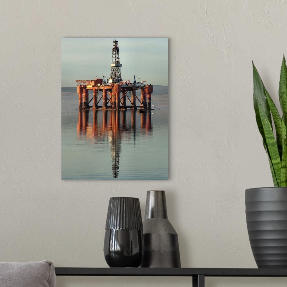 A modern room featuring The Semi Submersible Oil Rig the Transocean Wildcat in the Cromarty Firth, Scotland.