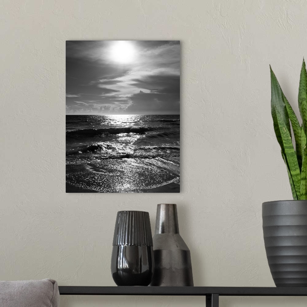 A modern room featuring Lido Beach black and white. Surf, sun and clouds.