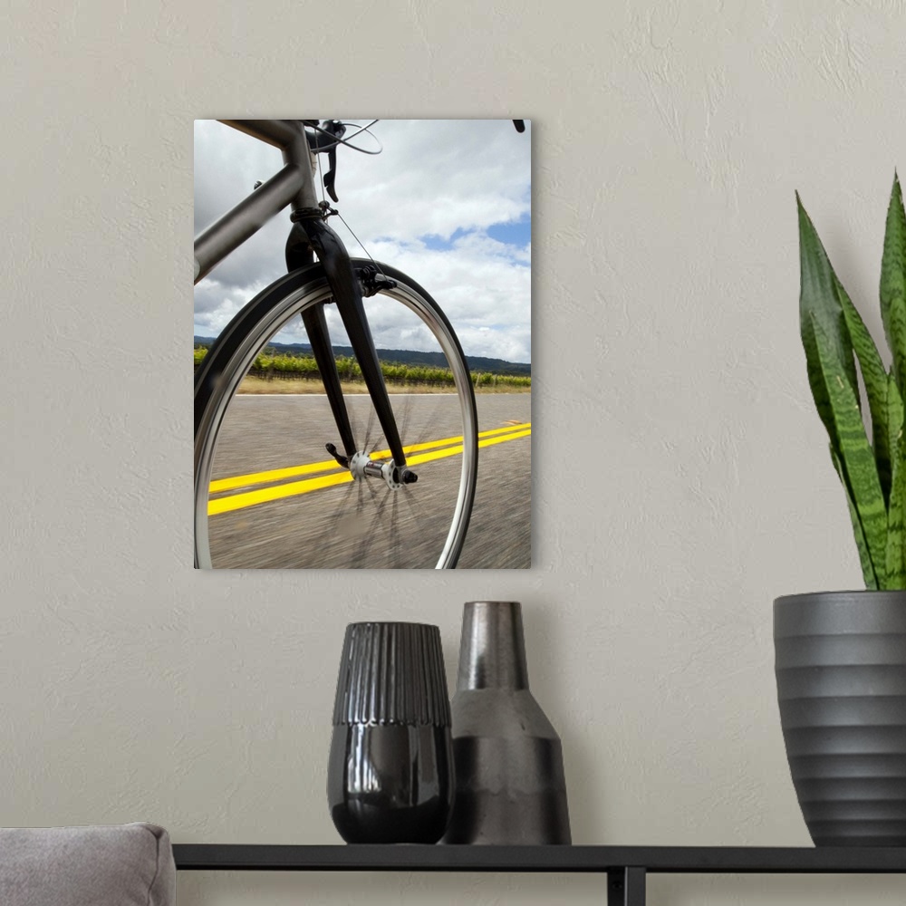 A modern room featuring Man road biking at high speed POV