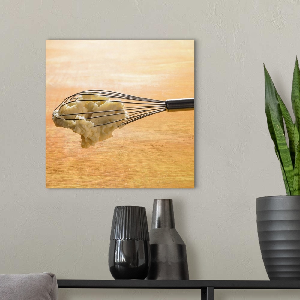 A modern room featuring Mashed potato hanging on whisk