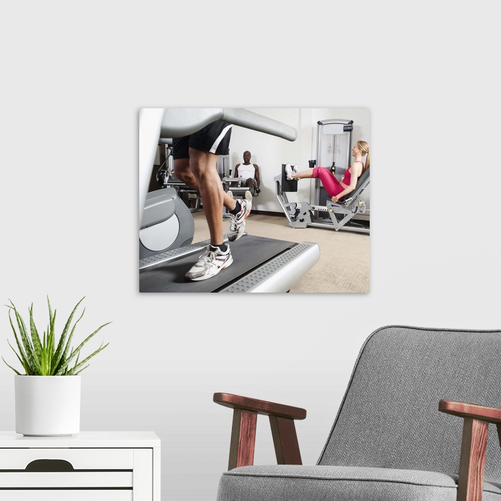 A modern room featuring People exercising in health club