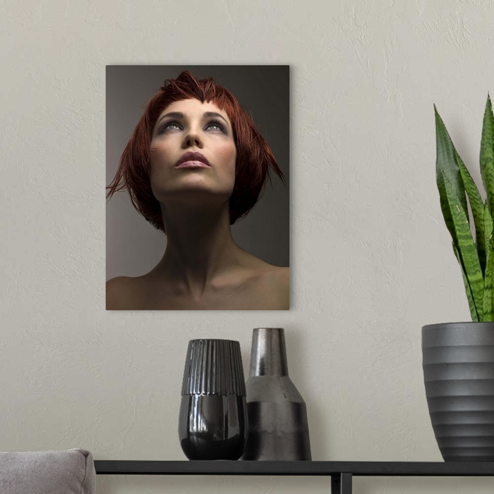 A modern room featuring Portrait of pensive woman with bare shoulders