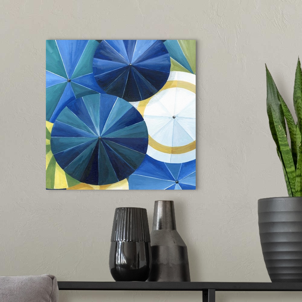 A modern room featuring Contemporary painting of a view of colorful umbrellas seen from above.