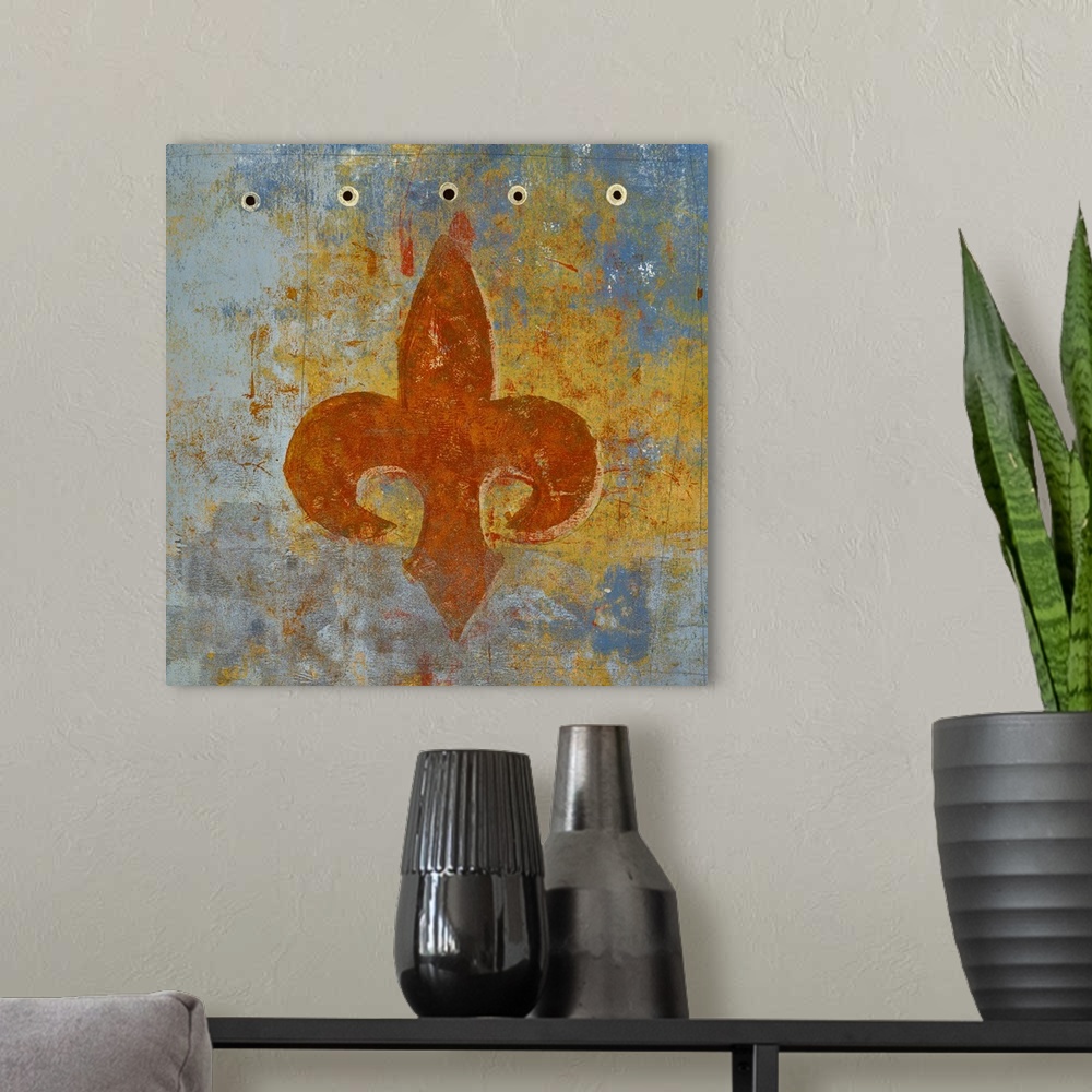 A modern room featuring Square abstract painting of a sienna orange fleur de lis on a blue, grey, and yellow background.