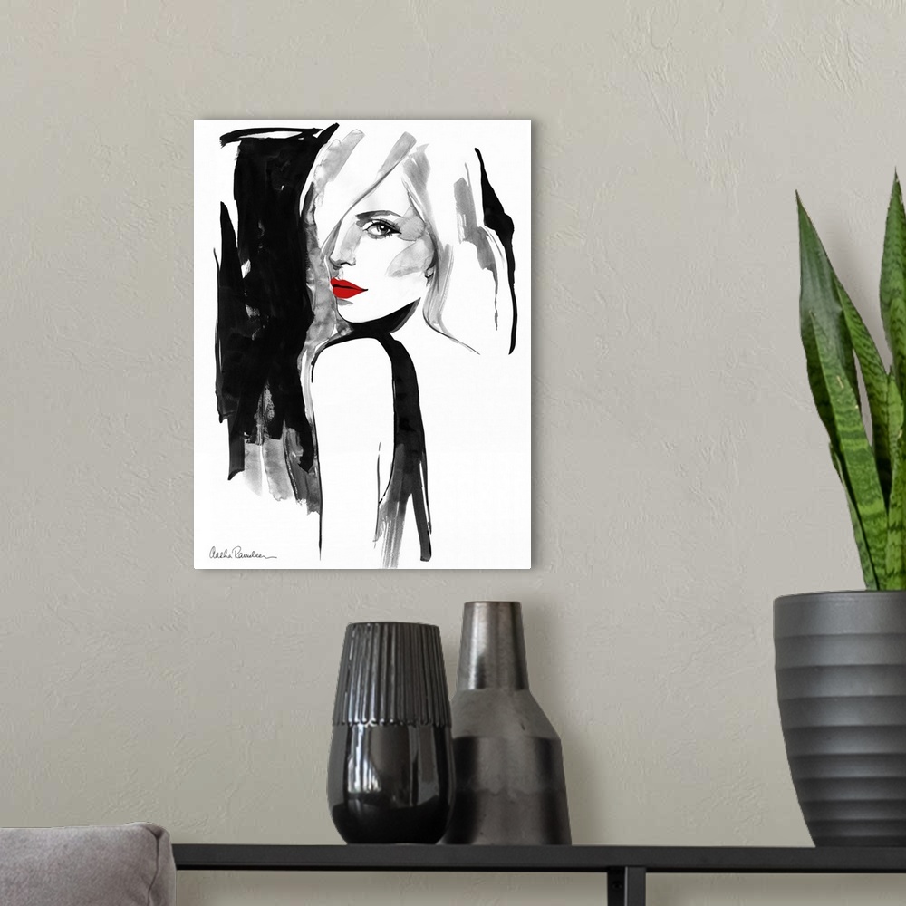 A modern room featuring Contemporary fashion artwork of a woman wearing bright red lipstick looking over her shoulder.