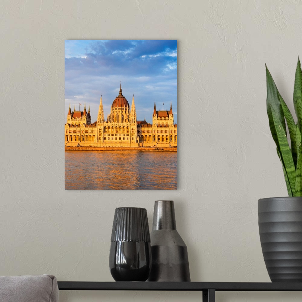 A modern room featuring Hungarian Parliament Building in the evening light, Budapest, Hungary.