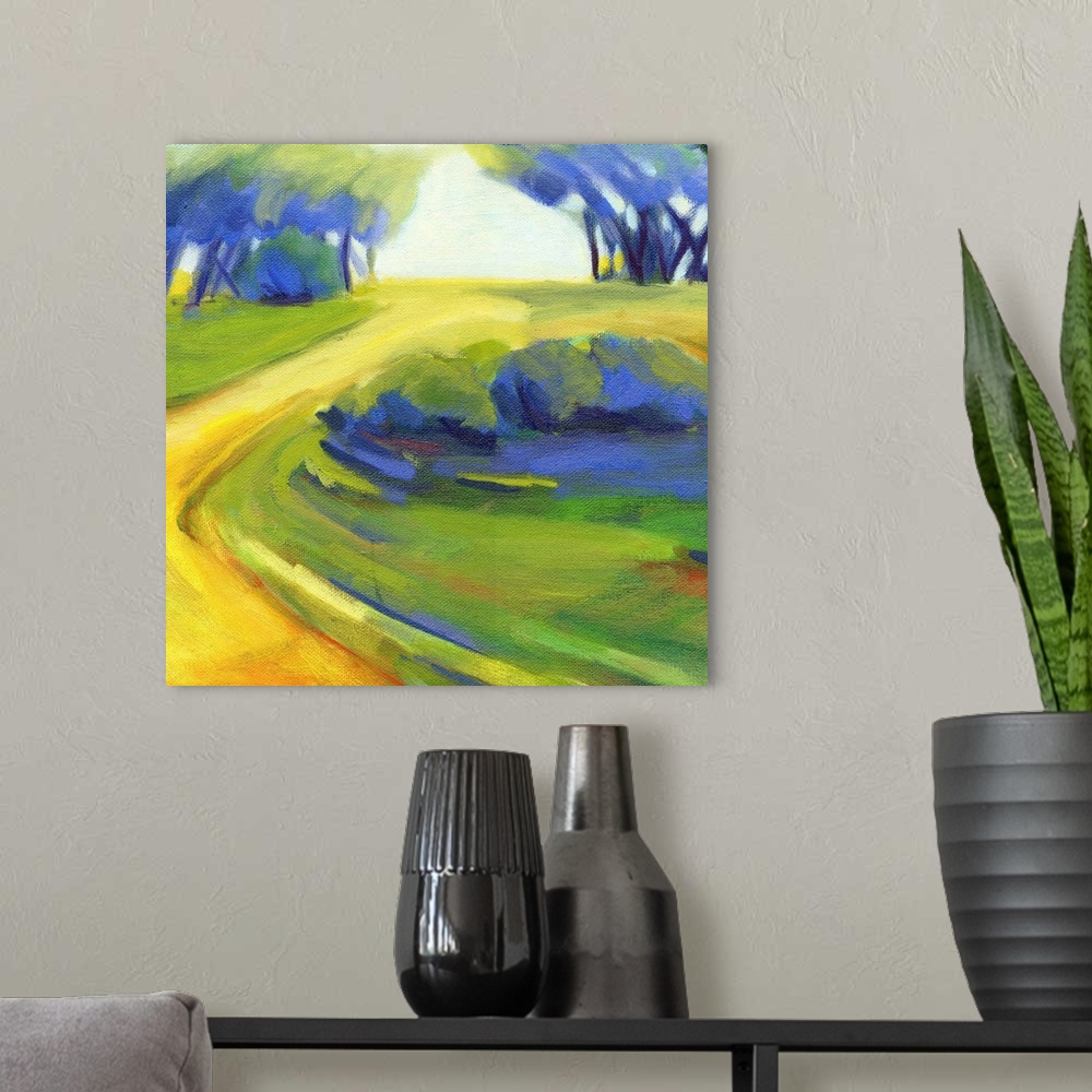 A modern room featuring A square painting of a winding road in the countryside.