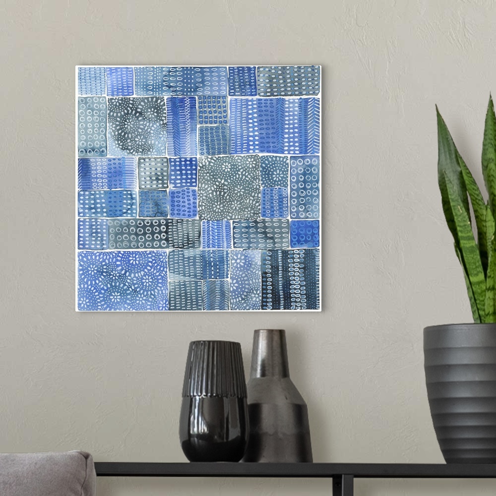 A modern room featuring Abstract batik patterns in shades of indigo, cobalt and gray, Shibori inspired.