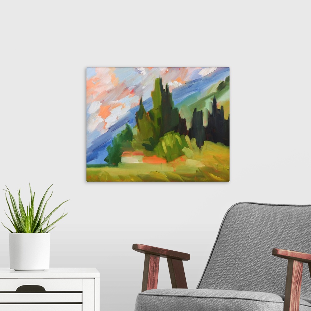 A modern room featuring Hillside scene in Tuscany with colorful sky and trees.