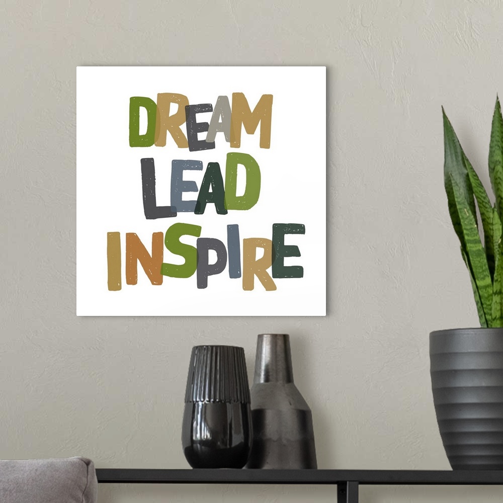 A modern room featuring Dream, Lead, Inspire