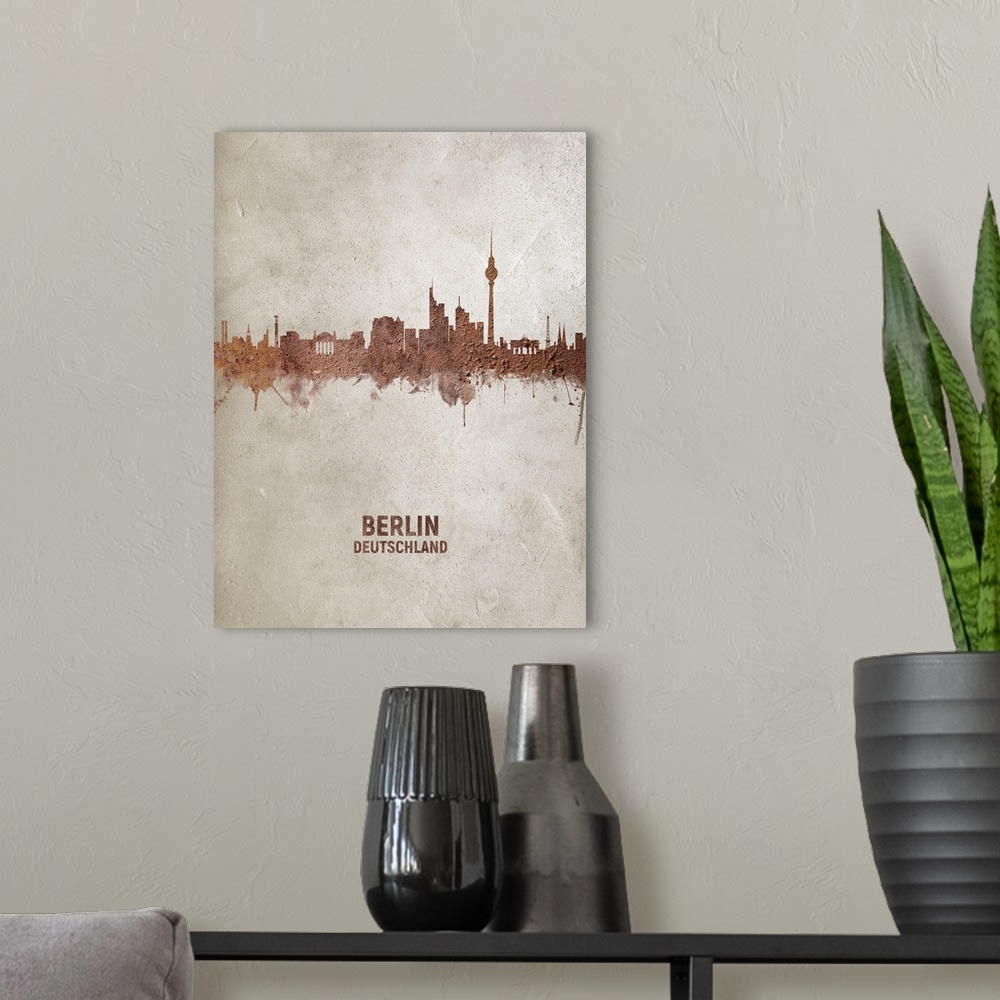 A modern room featuring Art print of the skyline of Berlin, Germany. Rust on concrete.