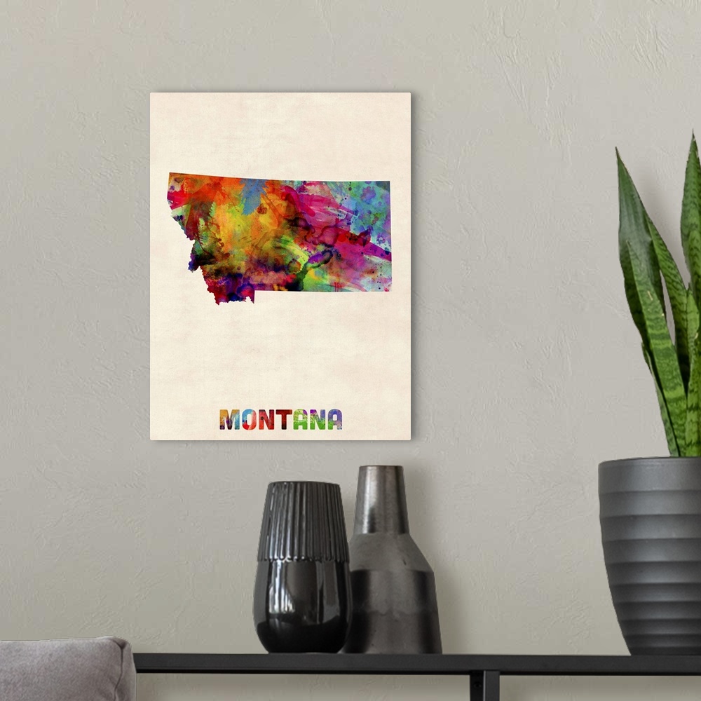 A modern room featuring Contemporary piece of artwork of a map of Montana made up of watercolor splashes.