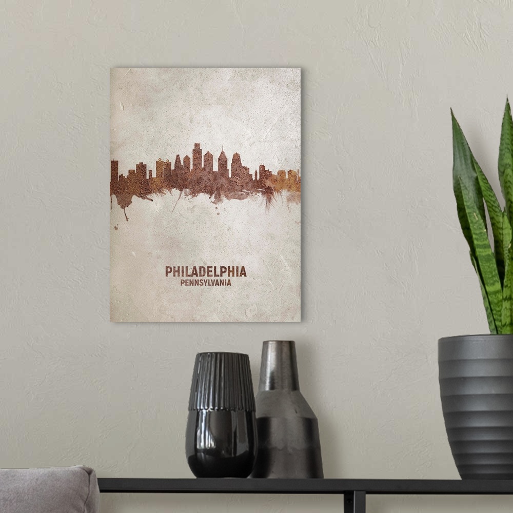 A modern room featuring Art print of the skyline of Philadelphia, Pennsylvania, United States. Rust on concrete.