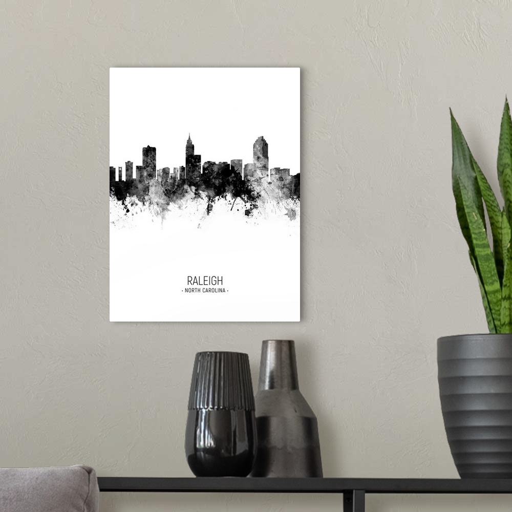 A modern room featuring Watercolor art print of the skyline of Raleigh, North Carolina, United States