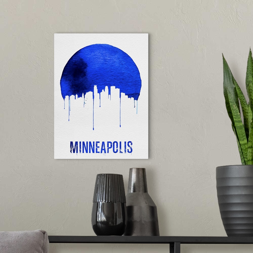 A modern room featuring Contemporary watercolor artwork of the Minneapolis city skyline, in silhouette.