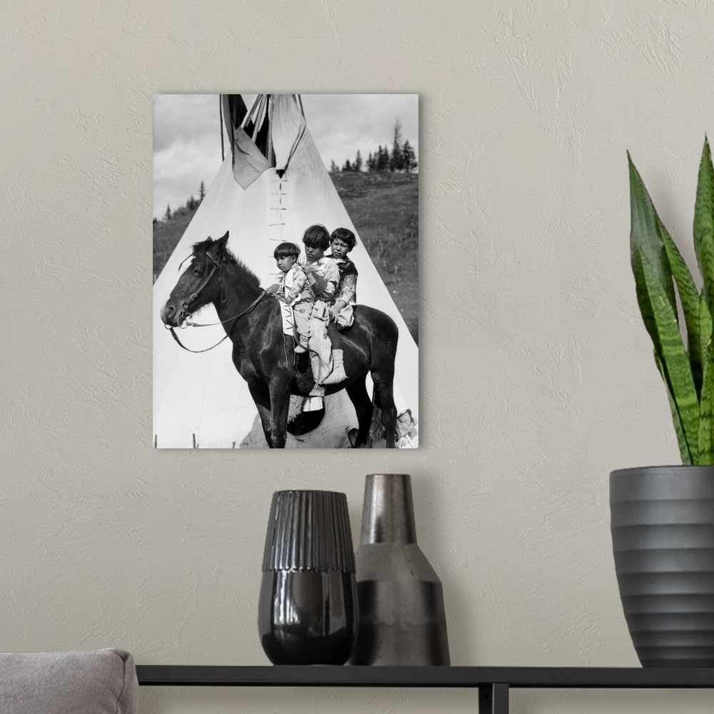 A modern room featuring 1920s Three Native American Stoney Sioux Indian Children Riding On Horse By Tepee Alberta Canada.