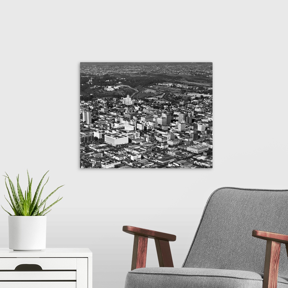 A modern room featuring 1950's Aerial View Showing El Cortez Hotel And Balboa Park Downtown San Diego, California USA.