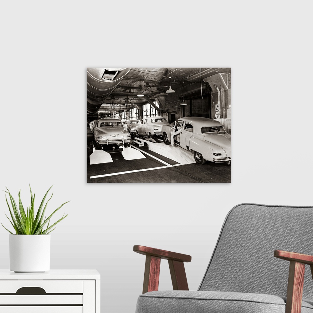 A modern room featuring 1950's Studebaker Automobile Production Assembly Line.