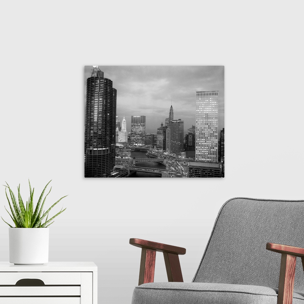 A modern room featuring 1960's Chicago River Bridges And Downtown Skyline At Dusk Chicago Il USA.