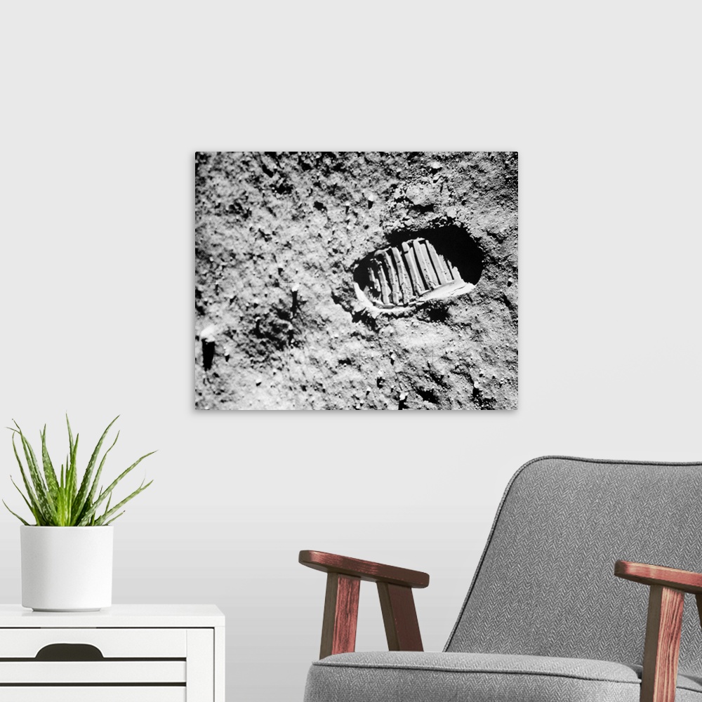 A modern room featuring 1960's Footprint Of First Step On Moon's Surface From Apollo 11 Mission.