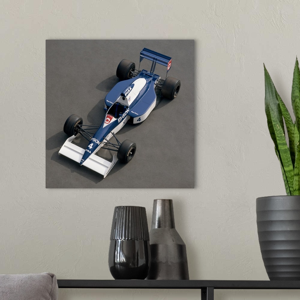 A modern room featuring 1989 Tyrrell-Cosworth 3.5 litre F1 single seat racing car. Driven by Jean Alesi. Country of origi...