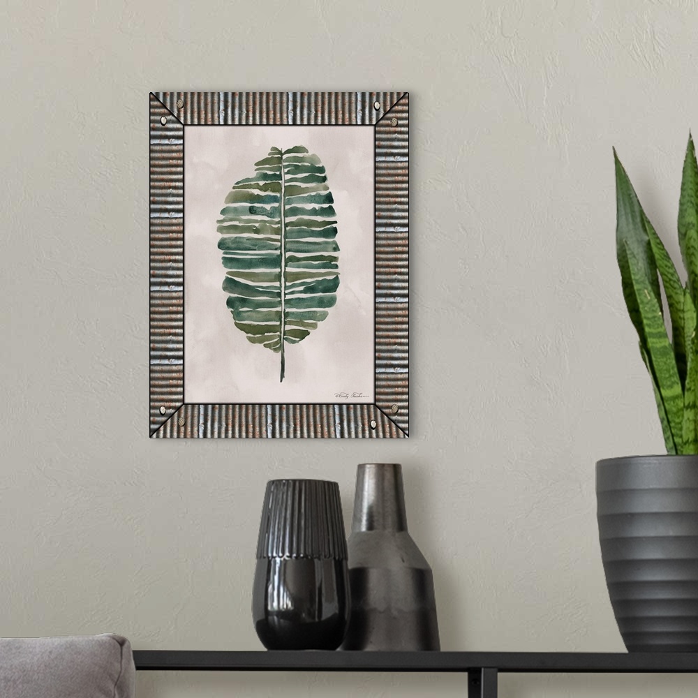 A modern room featuring Decorative artwork of watercolor leaf surrounding by a galvanized metal frame.