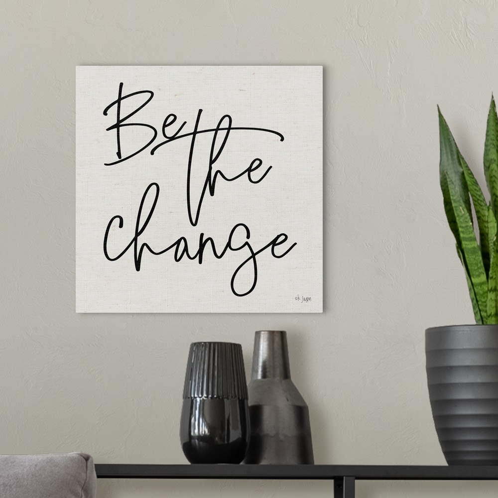 A modern room featuring Be The Change