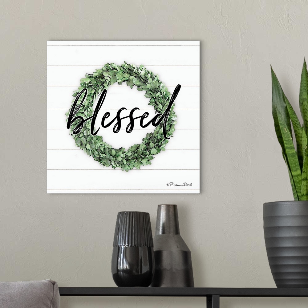 A modern room featuring Blessed Boxwood Wreath
