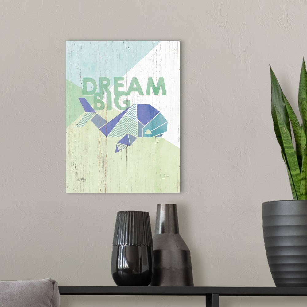 A modern room featuring Children's artwork of geometric whale with the words: Dream Big.