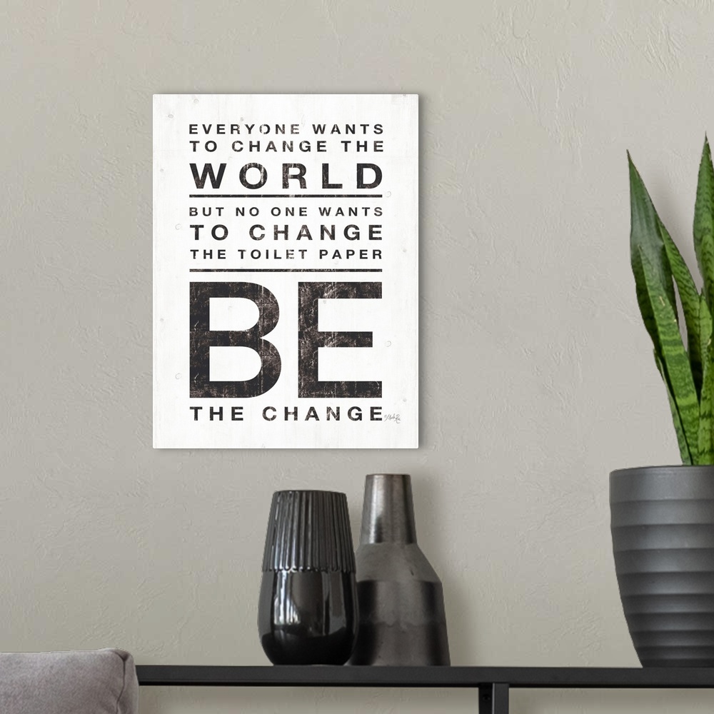 A modern room featuring Everyone Wants to Change the World