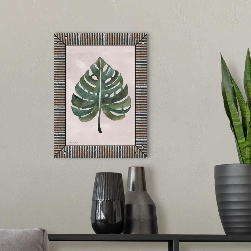 A modern room featuring Decorative artwork of watercolor leaf surrounding by a galvanized metal frame.